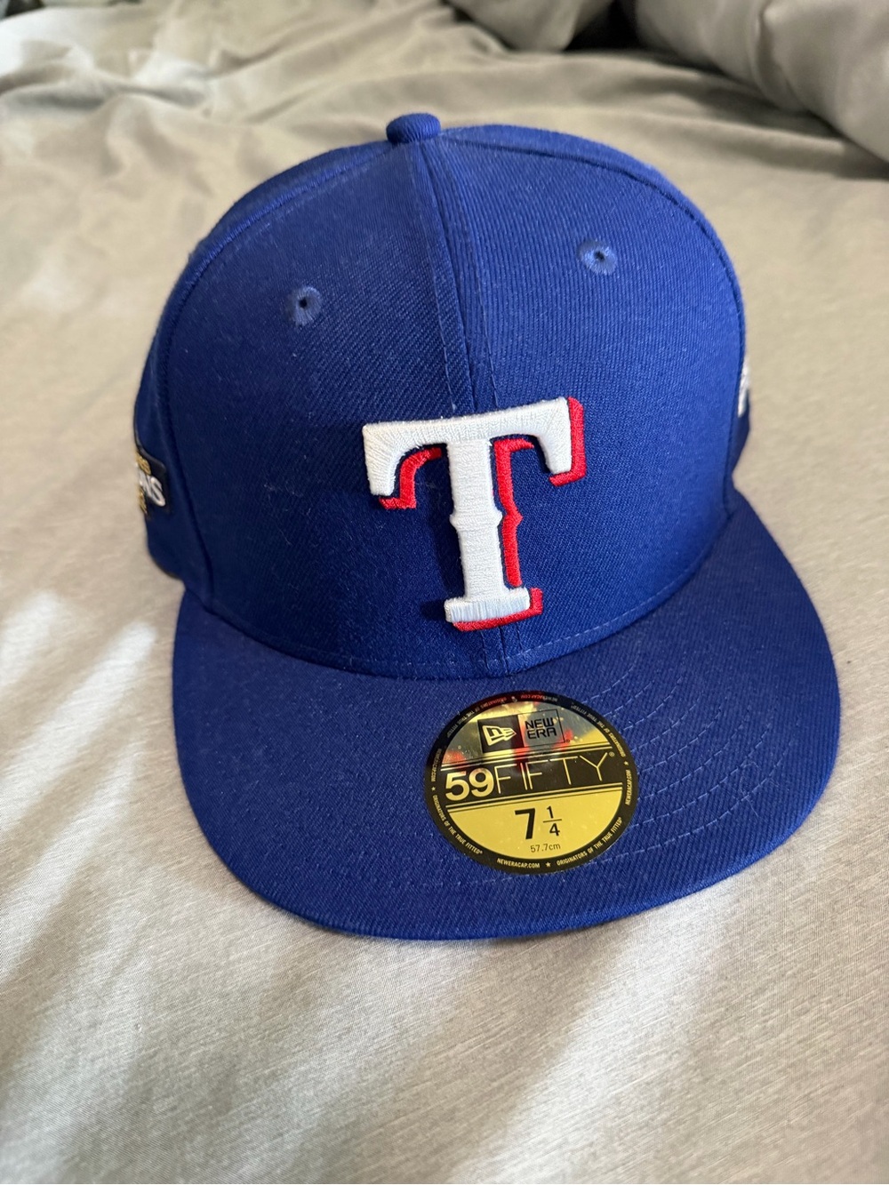 New Era Men’s Royal Blue Texas Rangers Fitted 7 1/4 hat World Series Champs!
